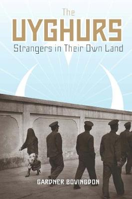 Uyghurs, The: Strangers in Their Own Land